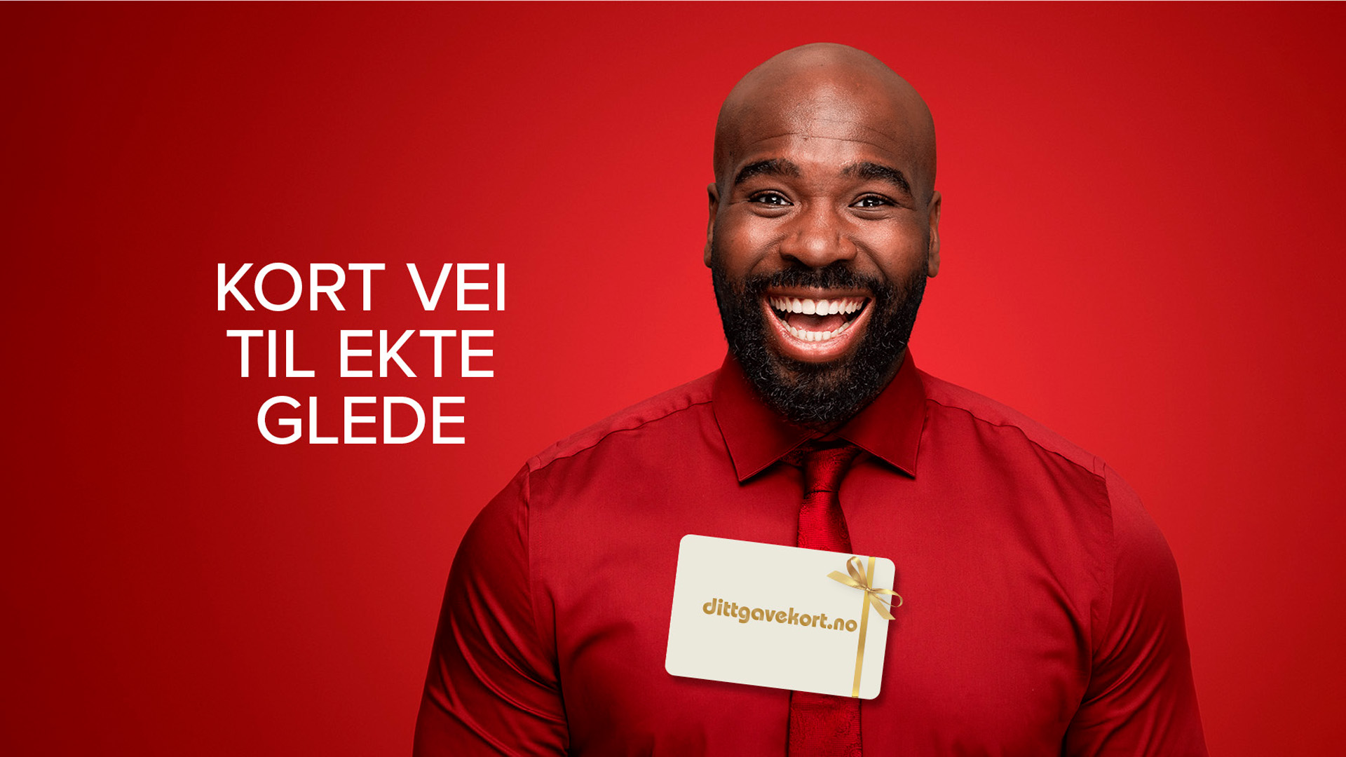 Mann som smiler i rød genser med dittgavekort.no